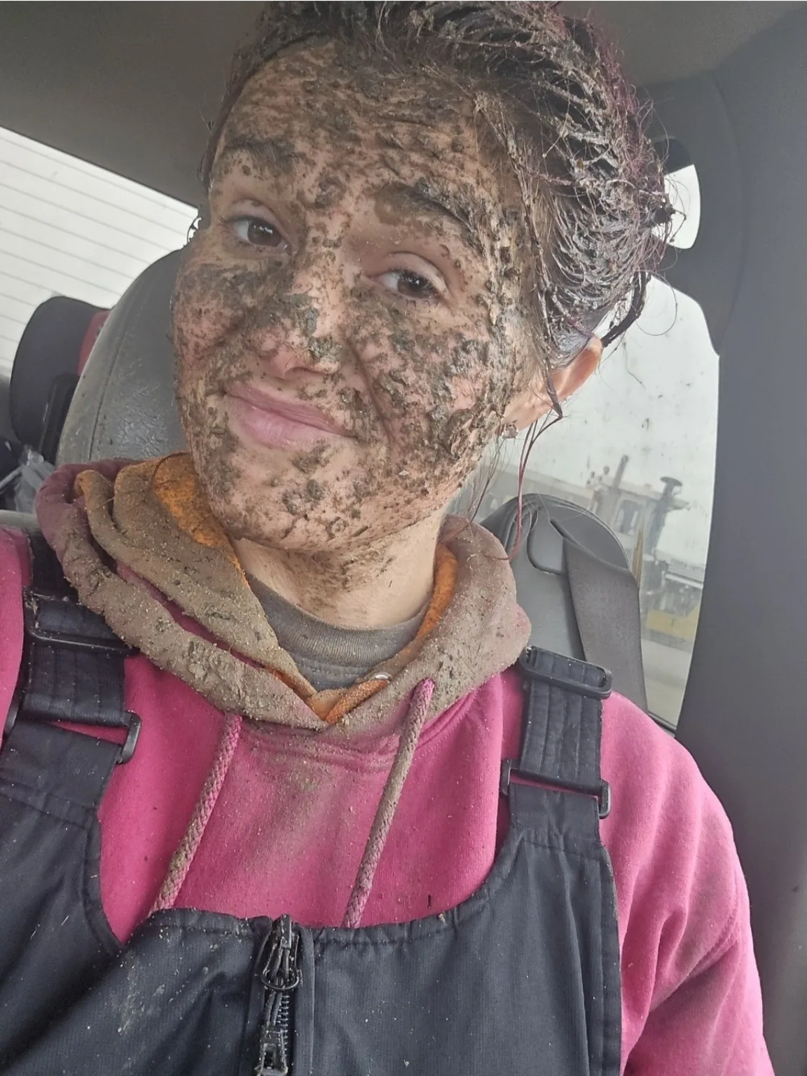 Kristen, owner of KB's, covered in grime after working